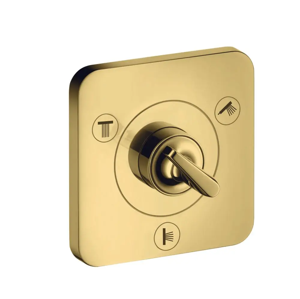 Axor Citterio E Ab- und Umstellventil in polierter Gold-Optik, quadratische Form mit einem zentralen Drehgriff und Symbolen für verschiedene Funktionen.